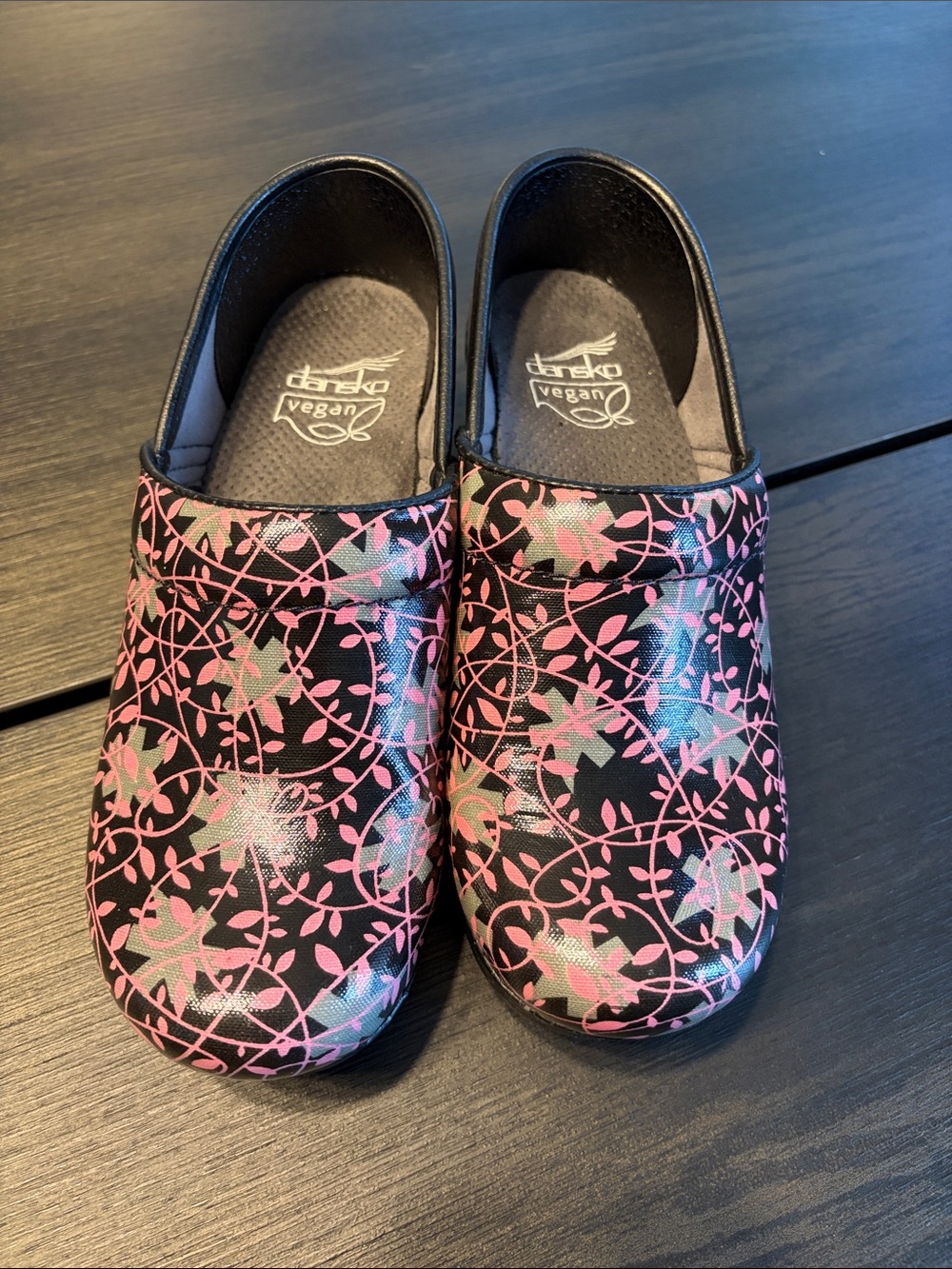Dansko Vegan Clogs in Black with Pink Floral Pattern